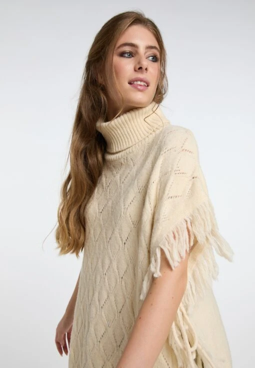 IZIA Ponchos & Kimonos Cape Dames Crème -Kledingwinkel 476173bb8bfb68740e995cab7382e78e scaled